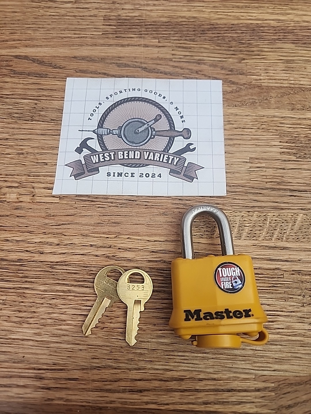 Master Lock 315KA Covered Outdoor Padlock with 2 Keys, 1 3/4″ Shackle, Yellow