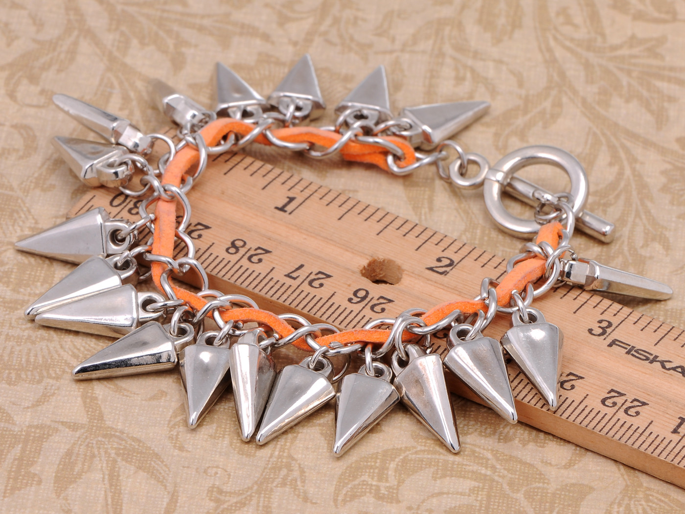 Silver Toned Multiple Studded Statement Bracelet Clr Orange Faux Leather Accent